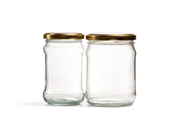 Empty glass jar over white background