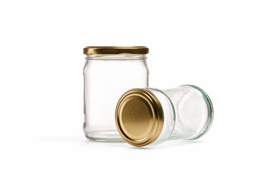 Empty glass jar over white background