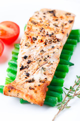 Salmon steak with thyme and pepper