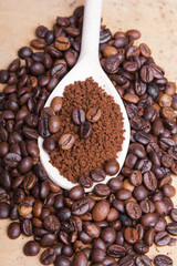instant coffee on coffee beans background
