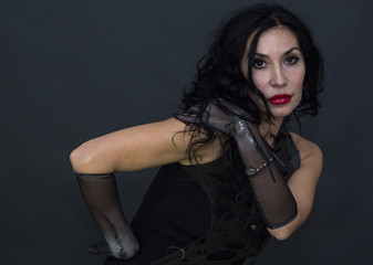 Portrait of a witch on a black background