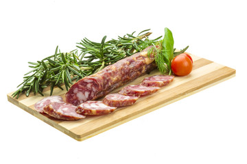 Salami with rosemary, basil and tomato