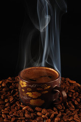 Turkish Caffee on Coffee on grain with smoke