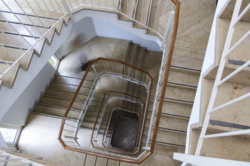 Spiraling Office Building Staircase Overhead Shot 