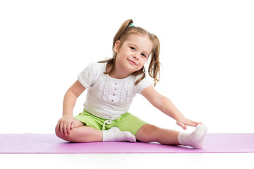 Obraz na płótnie Canvas Kid girl doing fitness exercises