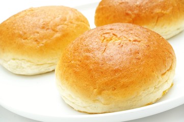 brioche muffin bun on white background