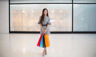 woman with shopping bags