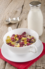 muesli and a bottle with milk