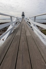 Obraz premium Steg mit Leuchtturm