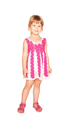 Naklejka premium Happy little girl in knitted pink dress.