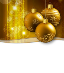 christmas baubles hanging on a glittering background