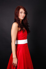 Fototapeta premium Frau mit rotem Abend Kleid