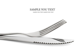 silver knife and fork on a white background with space for text