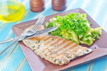 fried meat with salad