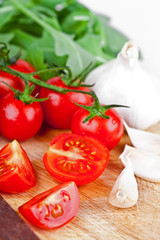 fresh tomatoes, rucola and garlic