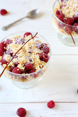 Delicious raspberry dessert with a biscuit cookies