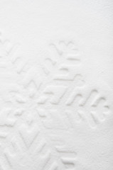 Snowflake shape on the snow