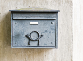 Old mailbox on a building wall, close-up