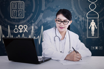 Asian doctor is writing prescription