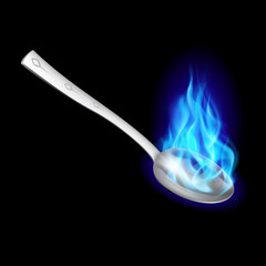Metal spoon with blue fire.