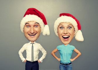 excited couple in santa hat