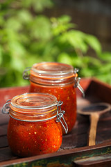Jar of home made classic spicy Tomato salsa