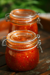 Jar of home made classic spicy Tomato salsa