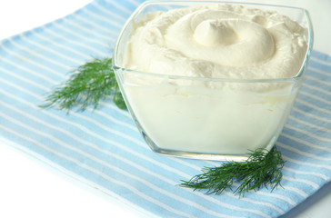 Sour cream in bowl close-up