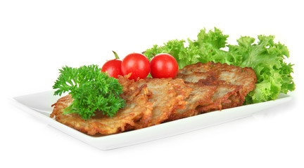 Potato pancakes on plate, isolated on white