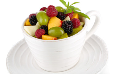 Fruit salad in cup isolated on white