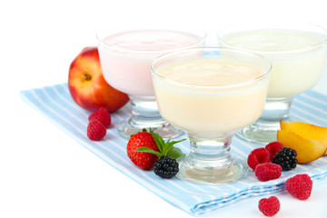 Delicious yogurt with fruit and  berries isolated on white
