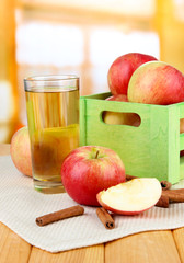Ripe apples with with cinnamon sticks