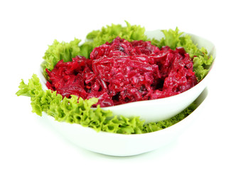 Beet salad on plates isolated on white