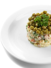 Russian traditional salad Olivier, isolated on white