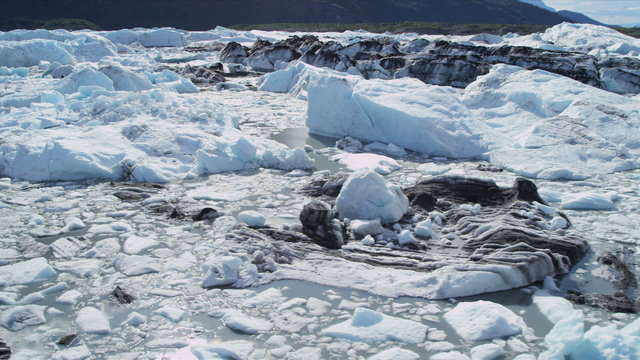 Aerial view of moraine covered Ice Glacier, Arctic Region