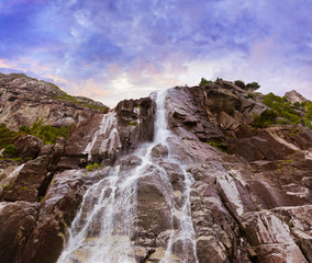Fototapeta na wymiar Waterfall in fjord Lysefjord - Norway