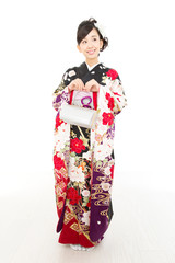 Beautiful asian kimono woman on white background