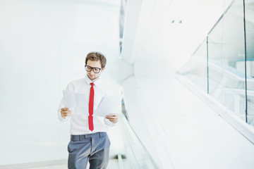 Fototapeta premium businessman comparing documents