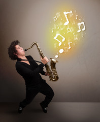 Handsome musician playing on saxophone with musical notes