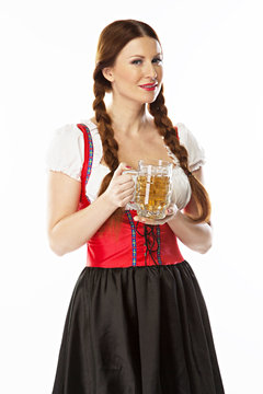 young and beautiful woman in a traditional Bavarian dress