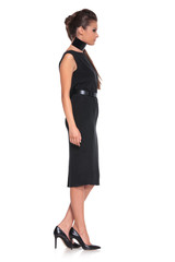 side view of a young fashion woman in black dress