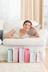 Portrait of a smiling woman with shopping bags