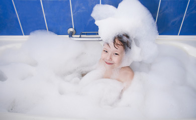 little girl in bath