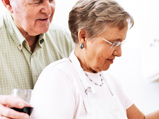 senior couple cooking together