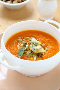 delicious soup with pumpkin and blue cheese