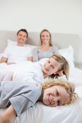 Obraz premium Happy family taking a rest