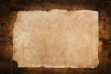 Vintage paper sheet on wood