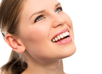 Teeth whitening. Dental care. Woman smiling.