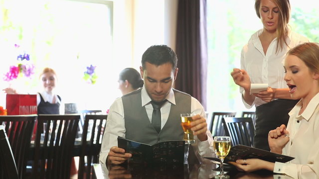 Business people having dinner together