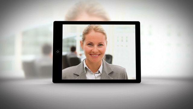 Tablet displaying business people